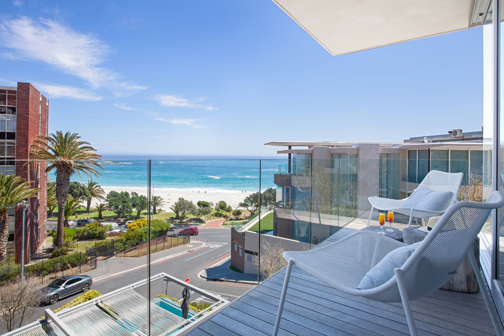 POD Hotel view from balcony over Camps Bay beach. The perfect stay for your Camps Bay Vacation.