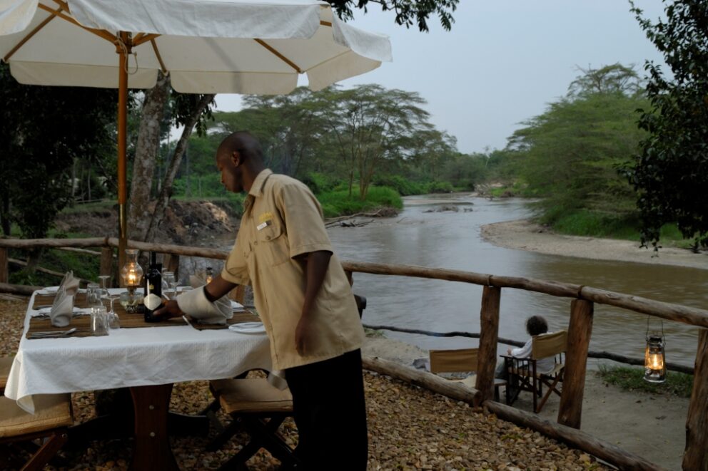 Private dining experience with a view of river in Uganda. This is a great experience for a Uganda honeymoon