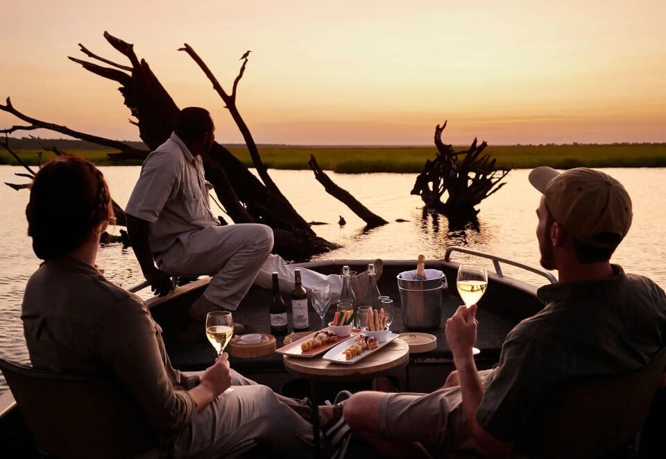 Boat cruise at sunset on the Chobe River, Botswana. Chobe National Park is one of the many iconic national parks in Africa.