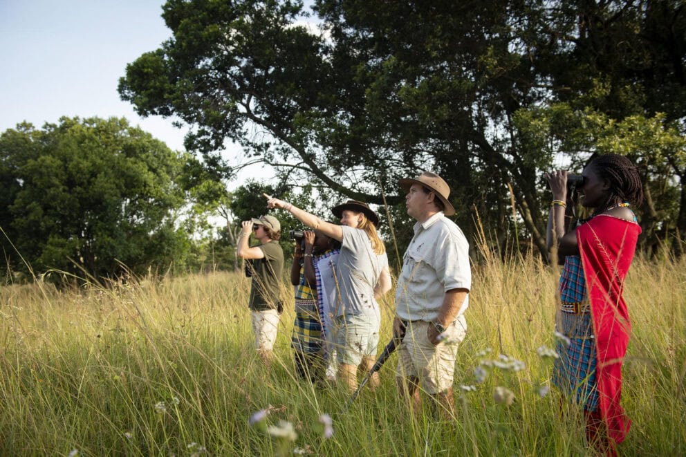 A group of tourist on a guided walking safari at Serian The Original, Kenya.