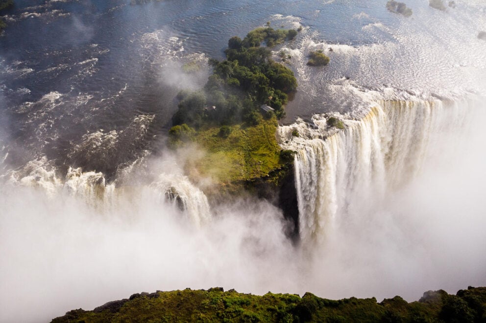 Aerial view of Victoria Falls and the rainforest the mist feeds at Sussi & Chuma Lodge, Zimbabwe.