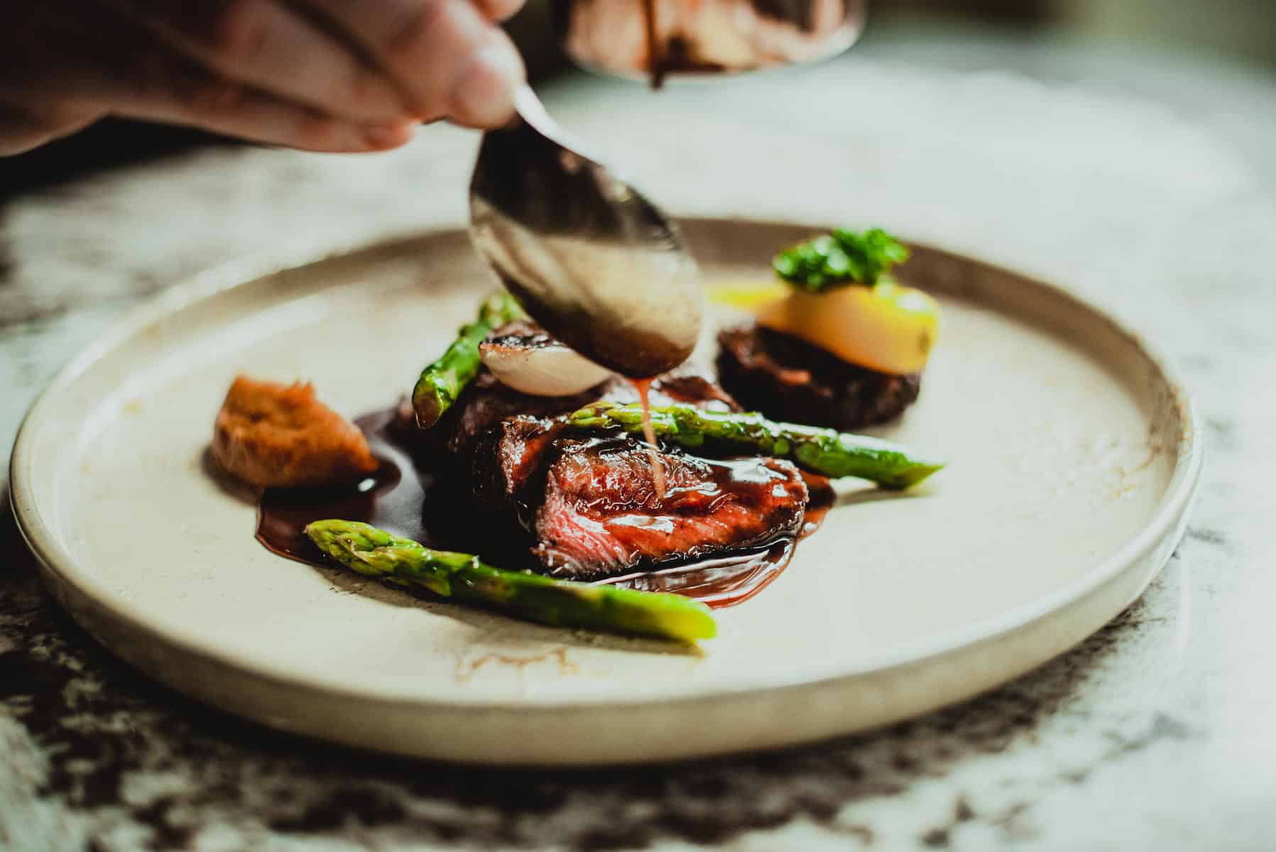 A plated gourmet meal at Ellerman House, South Africa.