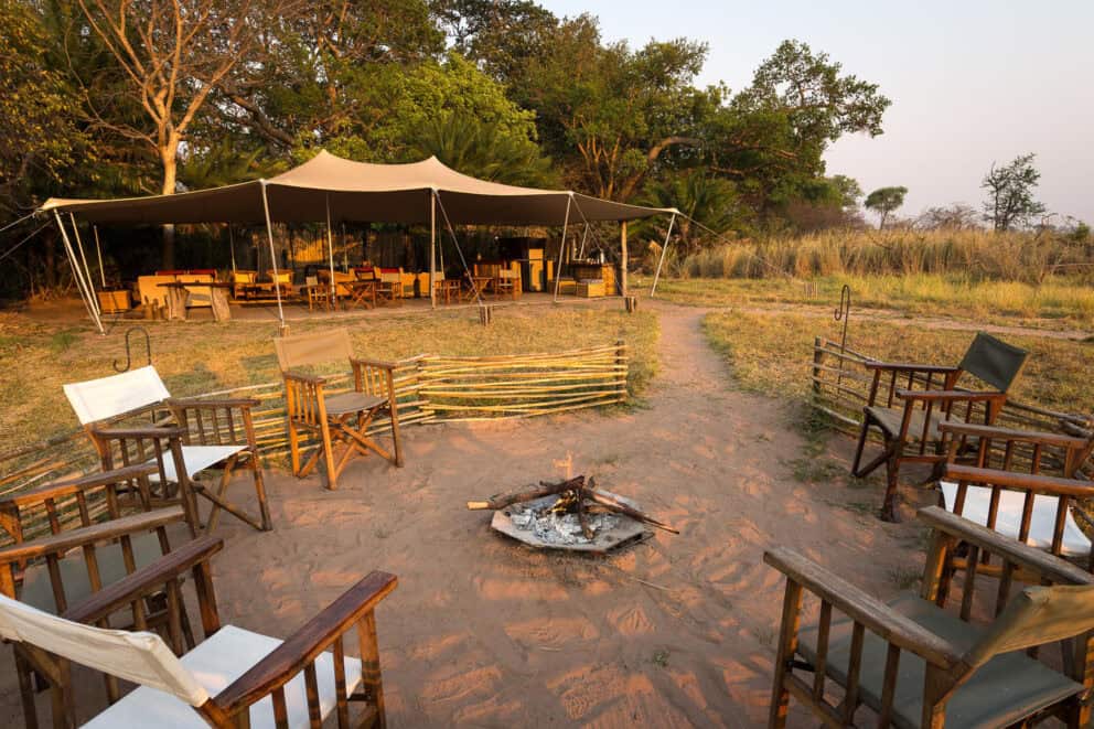 Exterior view of the main dining tent from the boma at Busanga Bush Camp, Zambia.