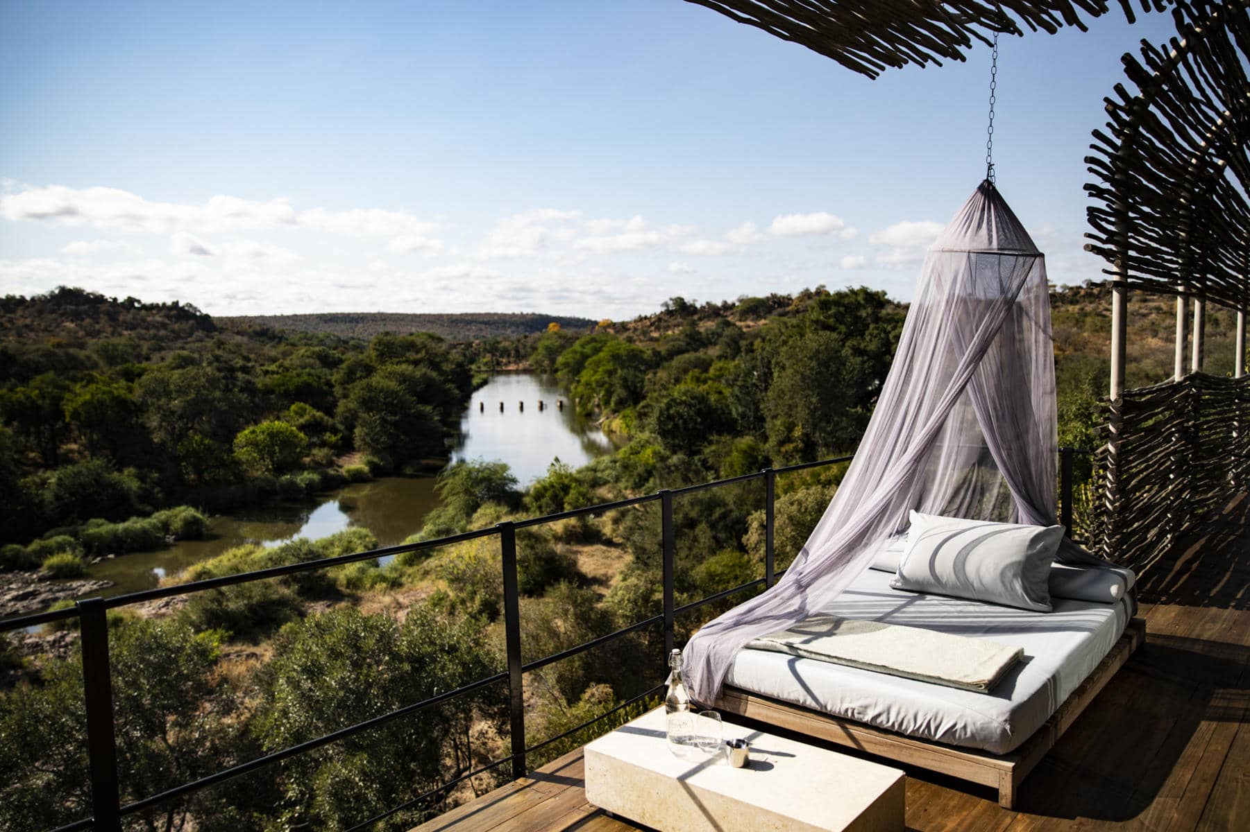 View of the bushveld from the outdoor sleeping bed at Singita Lebombo, South Africa.