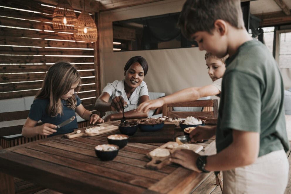 Kids cooking activity at Vumbura Plains, Botswana.
