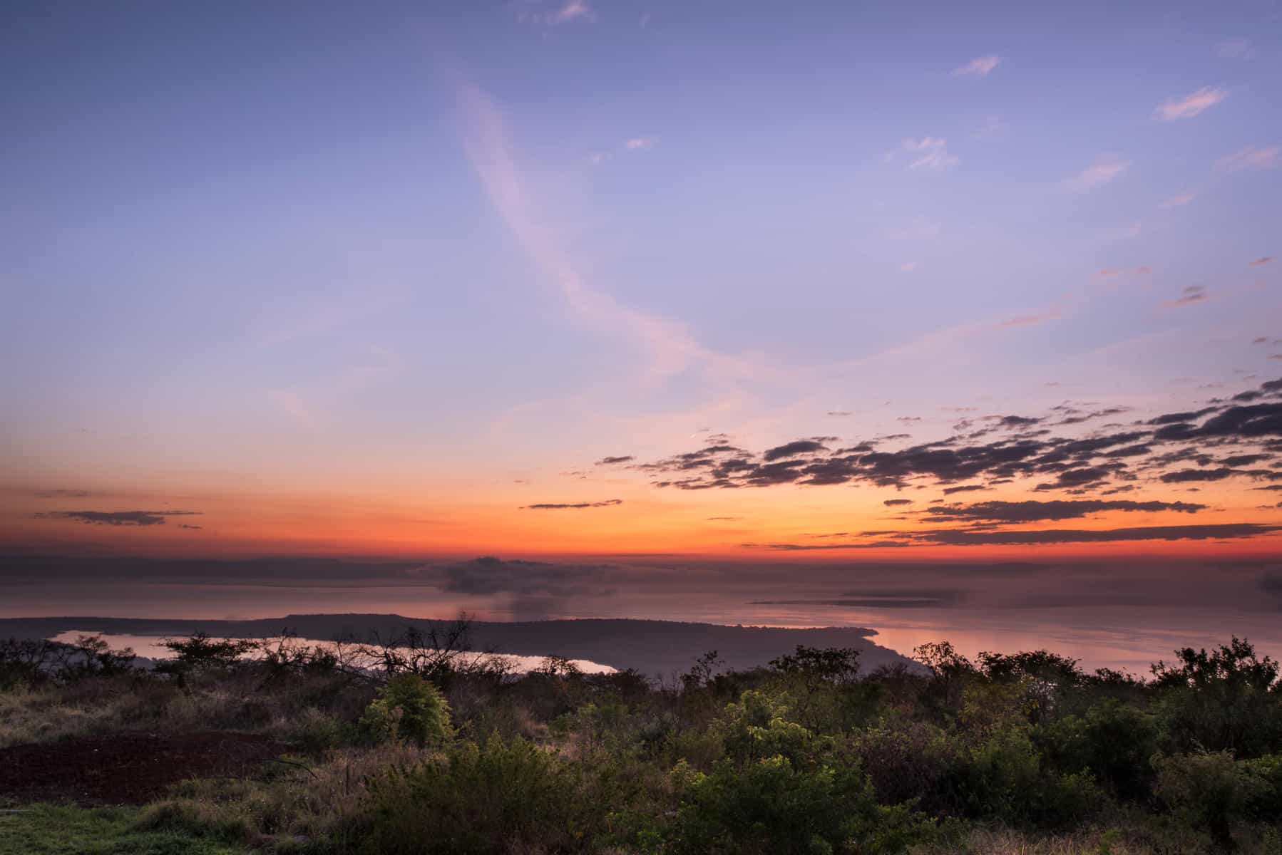 Sunset in Akagera National Park in Rwanda. 