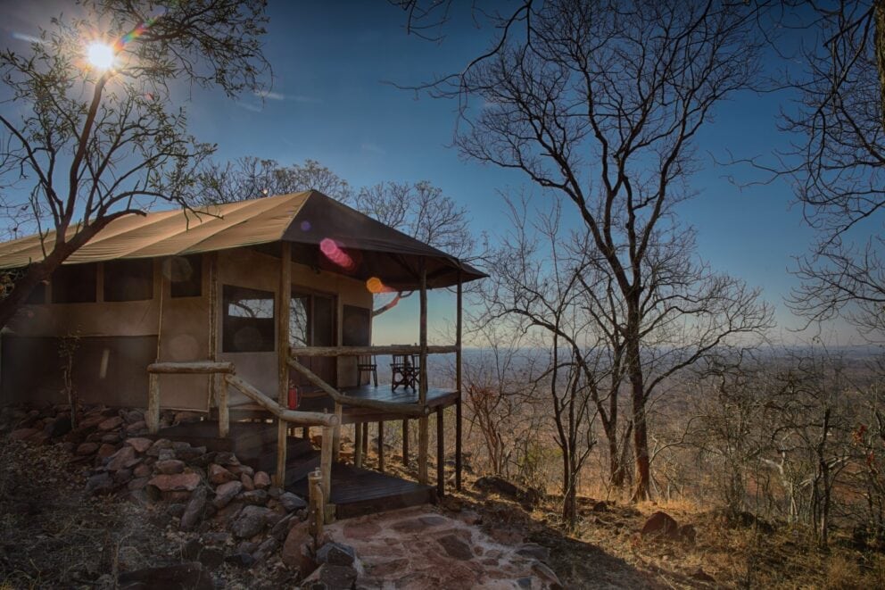 Exterior dusk view of a tented suite at Ghoha Hills, Botswana.