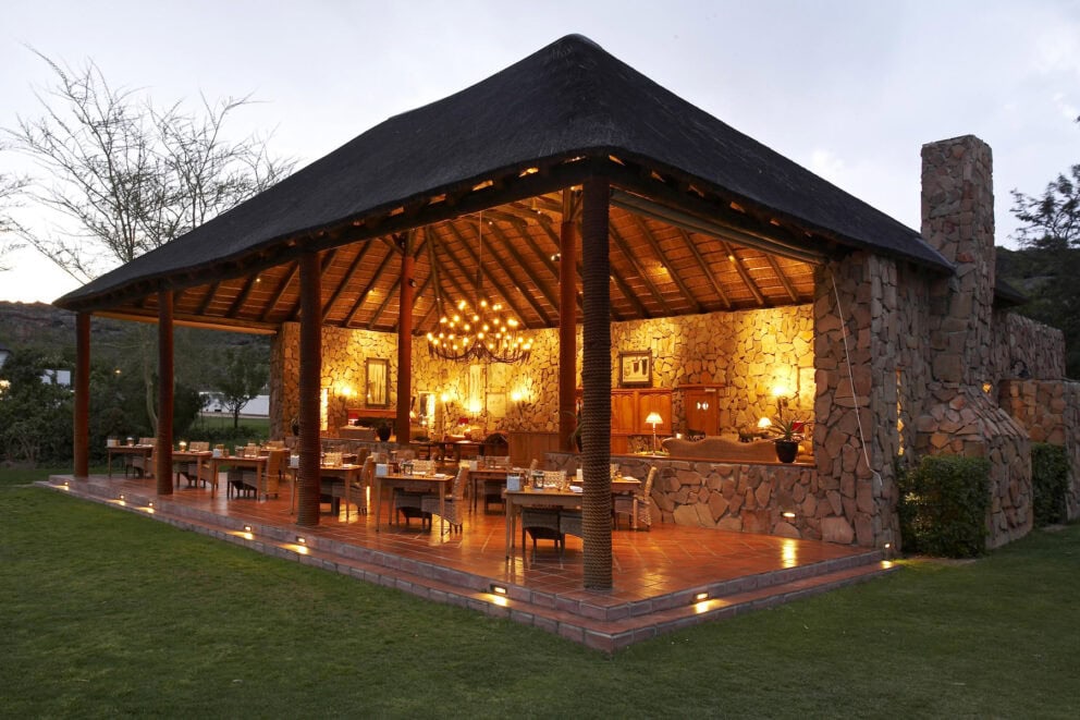 Candlelit dining area at Bushmans Kloof Wilderness Reserve & Wellness Retreat, South africa.
