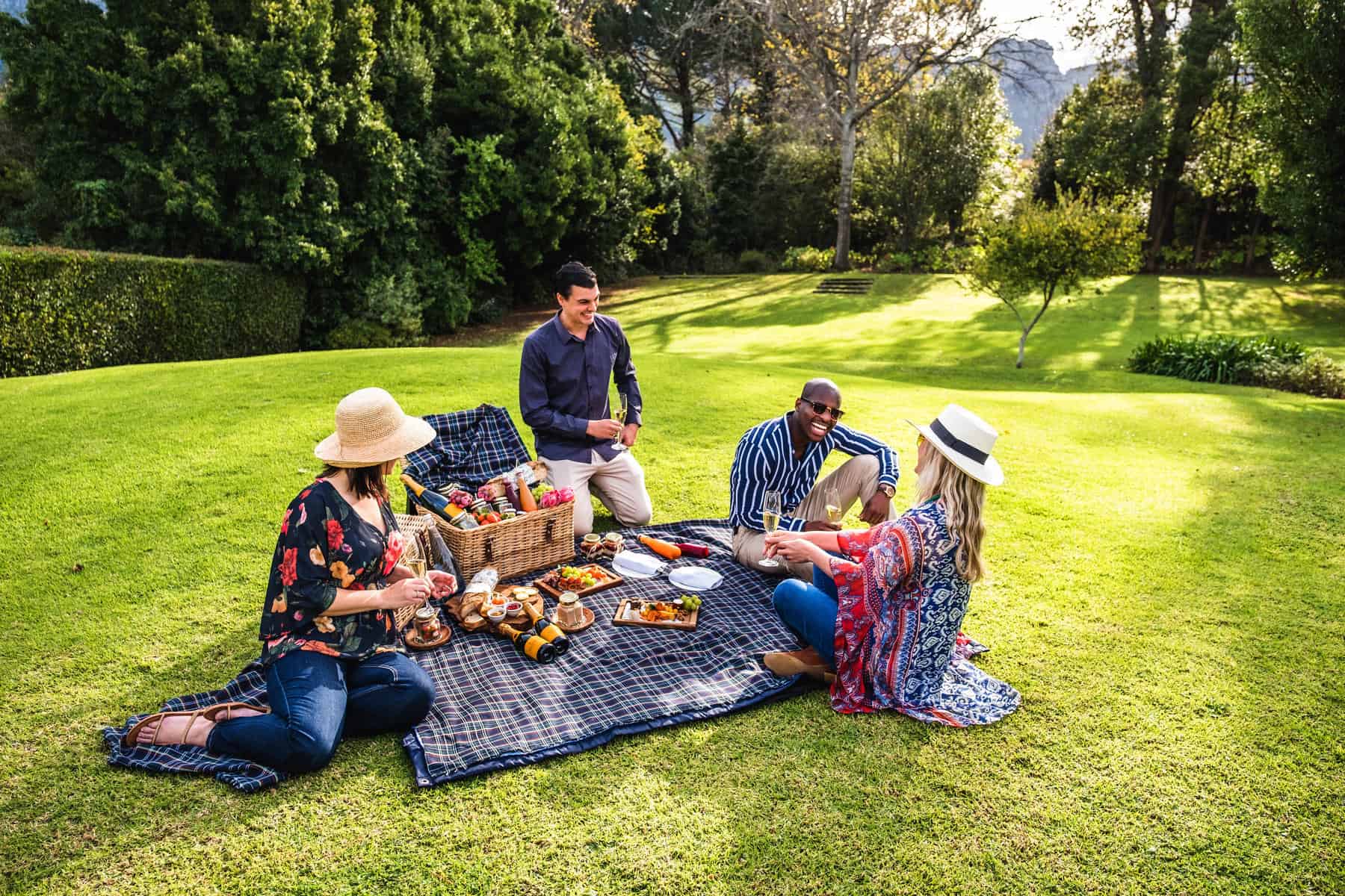 Friends enjoying a picnic at The Cellars Hohenort, South Africa.