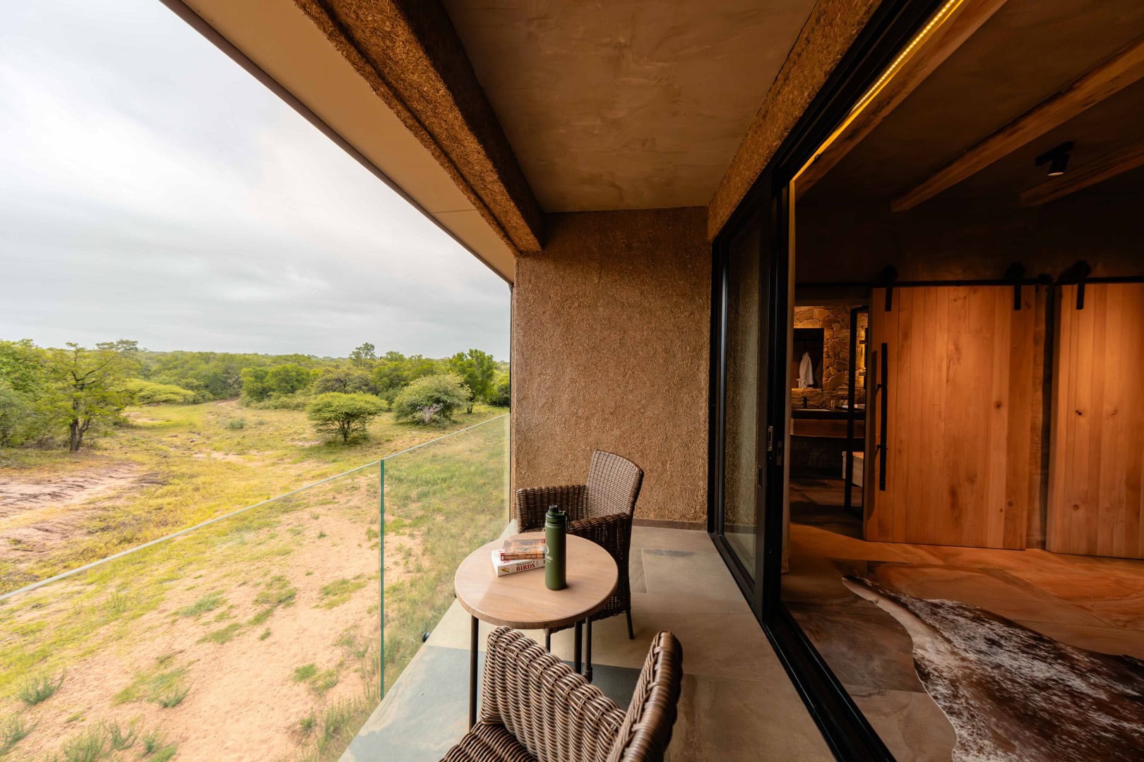 A view of the bushveld from a deluxe suite balcony at Kapama River Lodge.