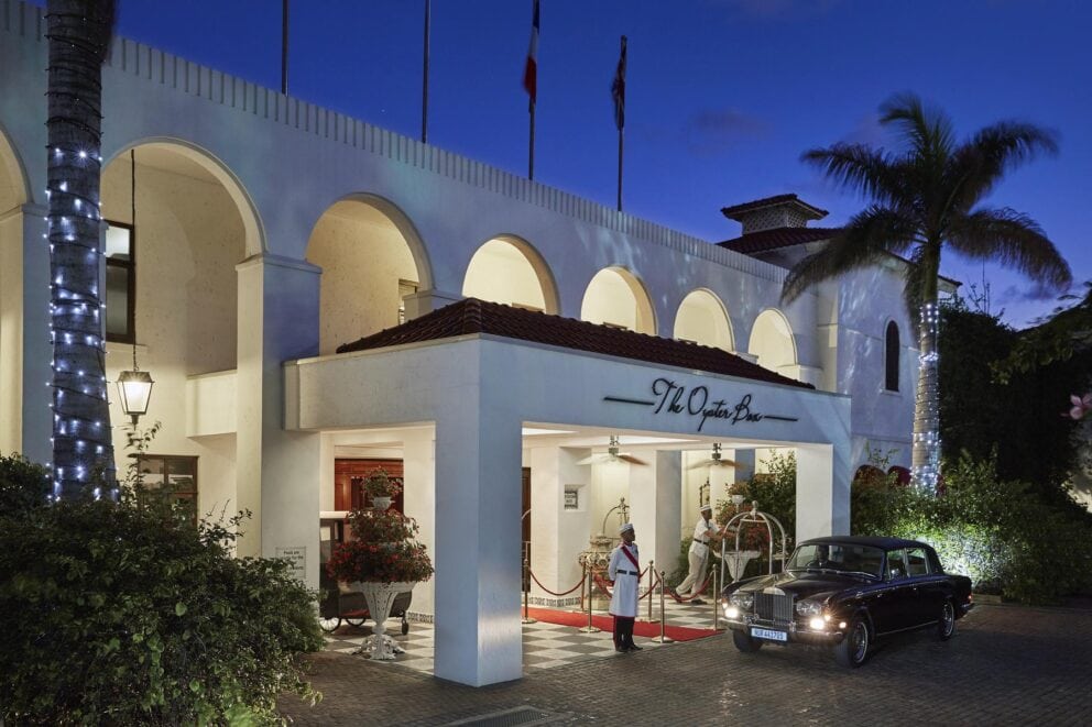 Exterior view of The Oyster Box Hotel at night