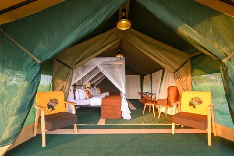 Interior of a tented suite at Nasikia Mobile Migration Camp, Tanzania.