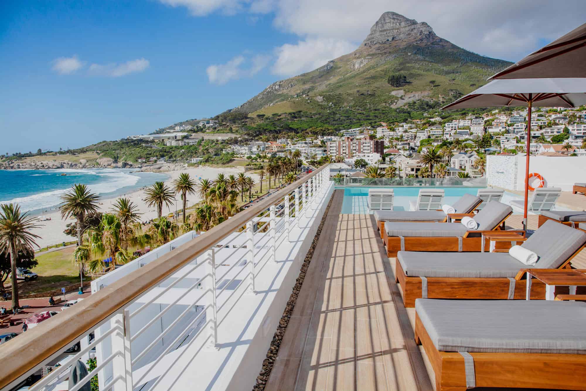Stunning view of the beach and mountains from the rooftop lounge at The Marly Boutique Hotel and Spa, South Africa.