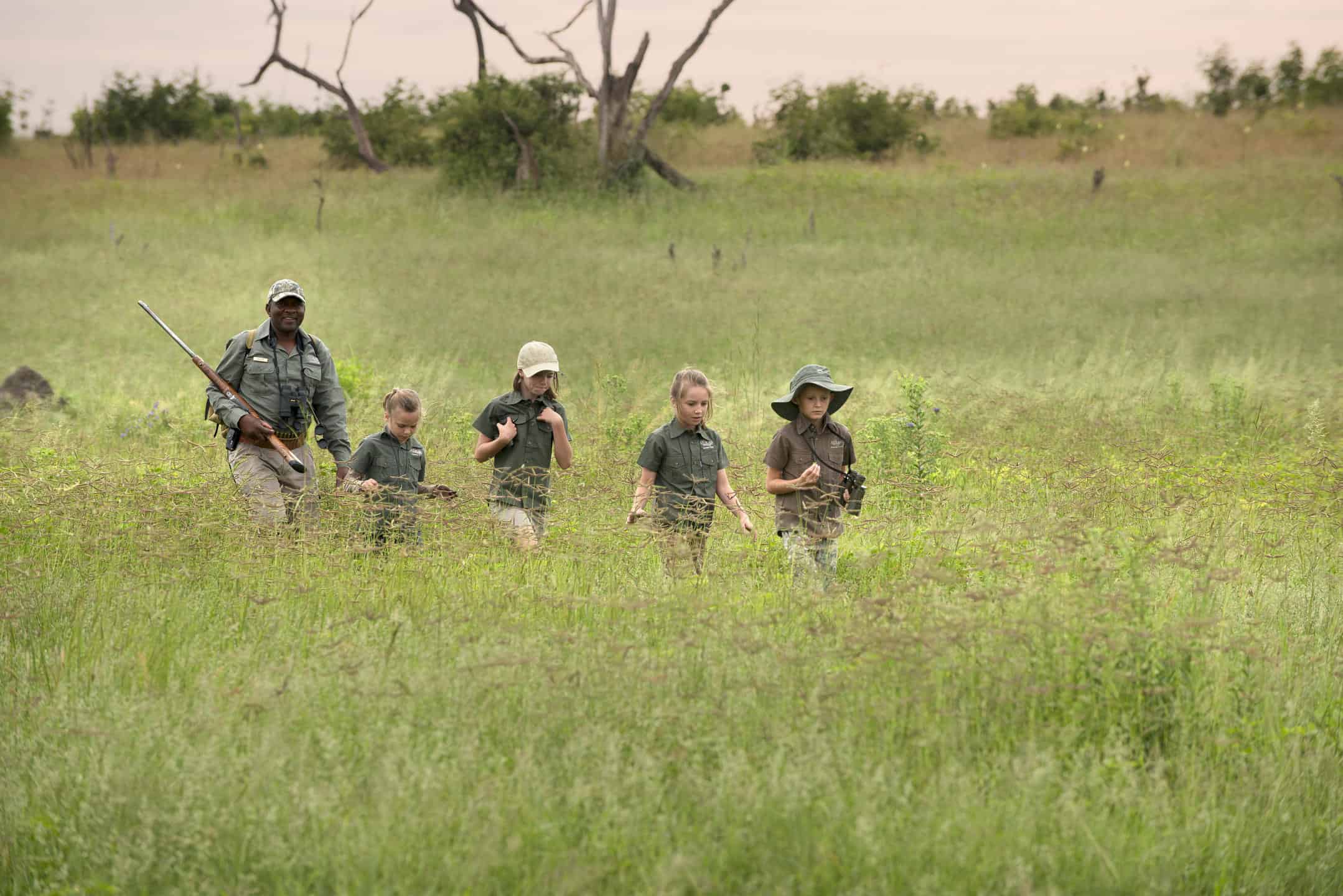 Walking safari with kids in Botswana, showing that Botswana is safe for family travel and adventure