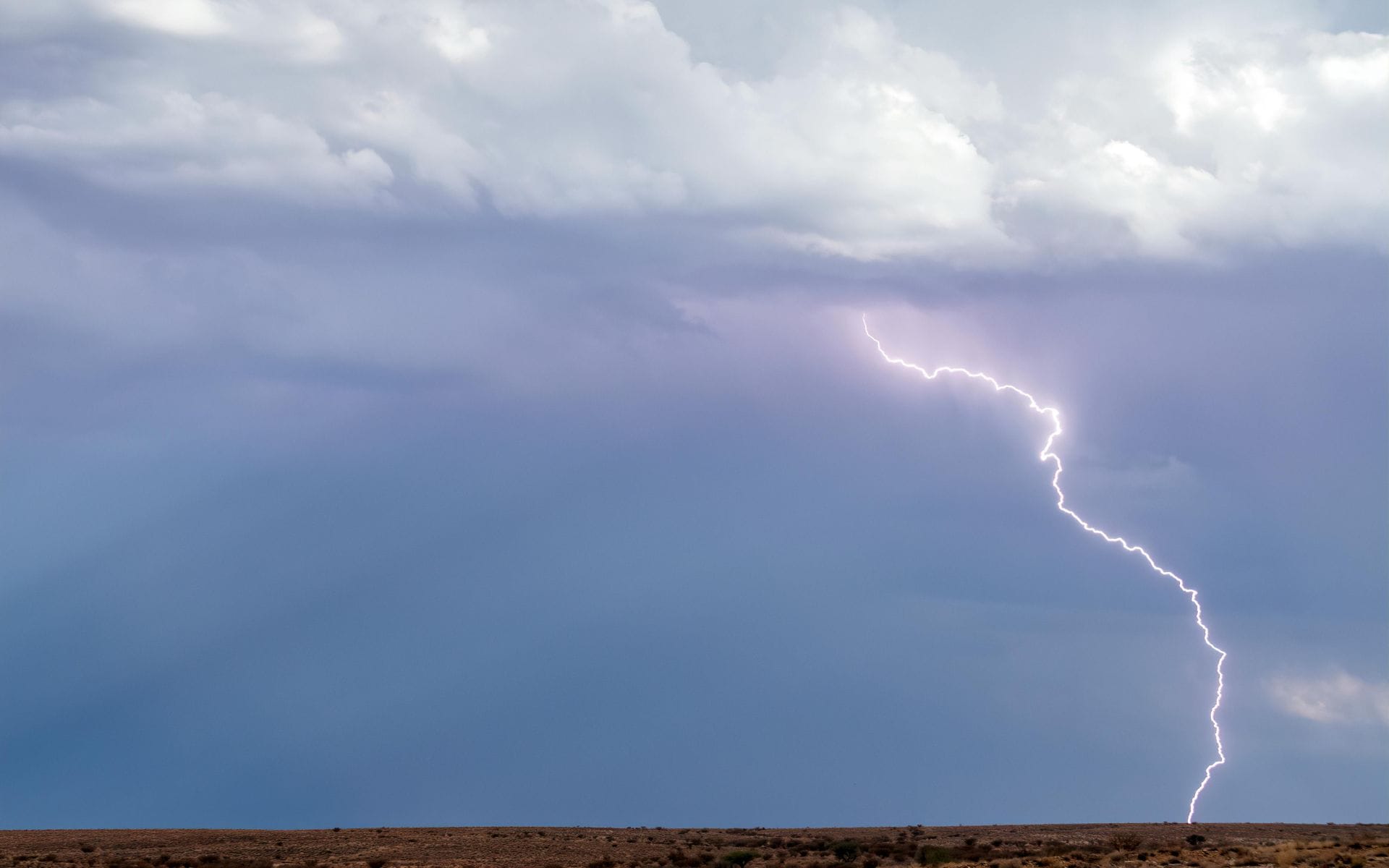 Thunderstorm over a desert. 