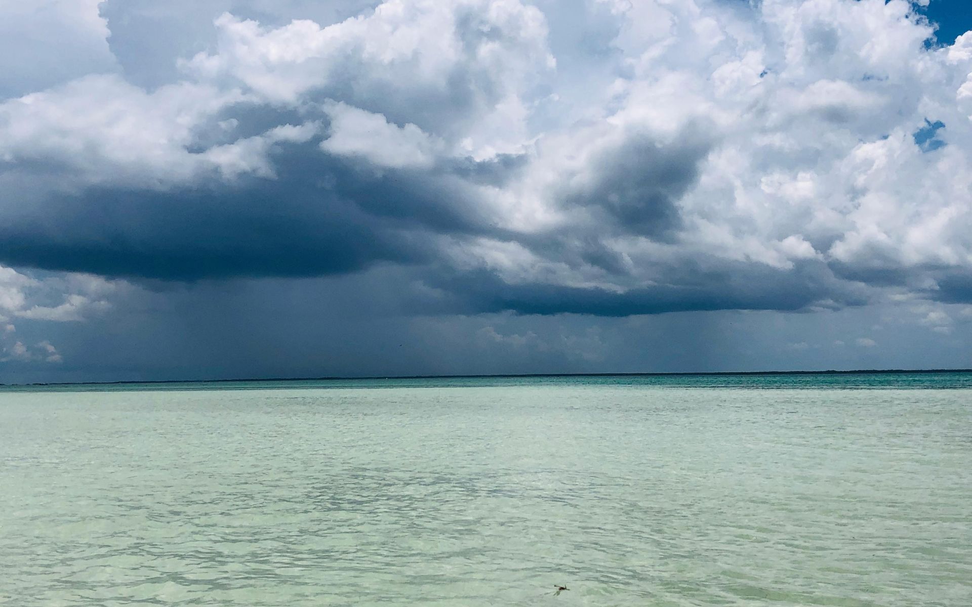 View of clouds forming over the ocean.
