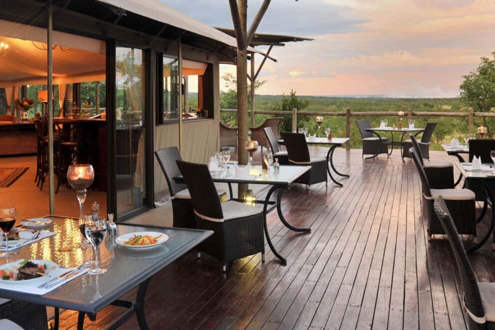 Outdoor dining area at a luxury lodge, Zimbabwe | Photo credits: Victoria Falls Safari Lodge