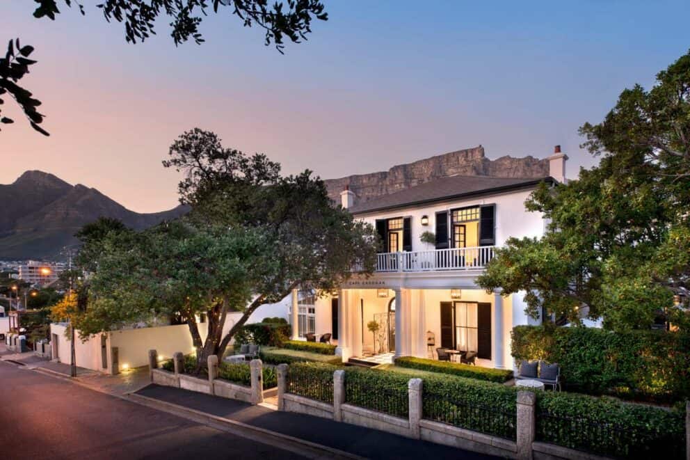 View of Cape Cadogan Boutique Hotel exterior at sunset