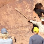 Guide explaining the San rock art at Twyfelfontein, Namibia
