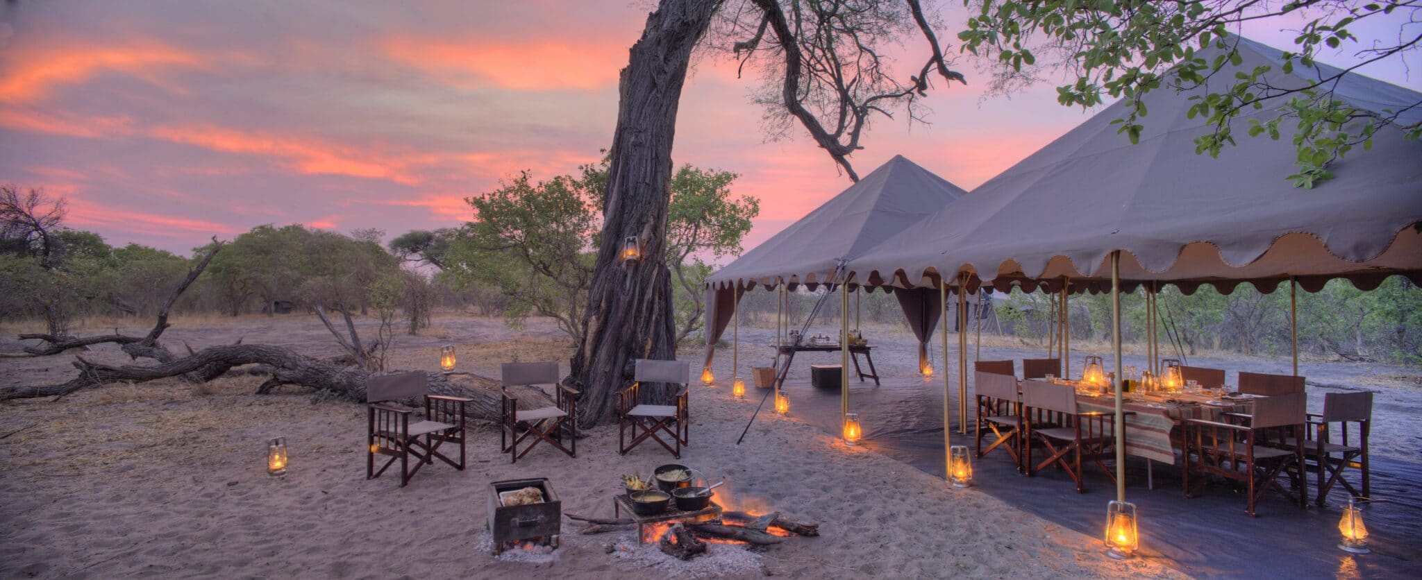 A mobile tented camp at sunset in Botswana