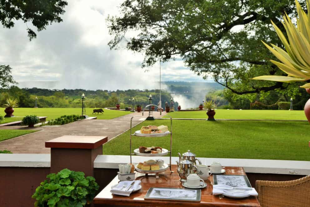 An afternoon high tea with a view of the Victoria Falls bridge at The Victoria Falls Hotel, Zimbabwe.