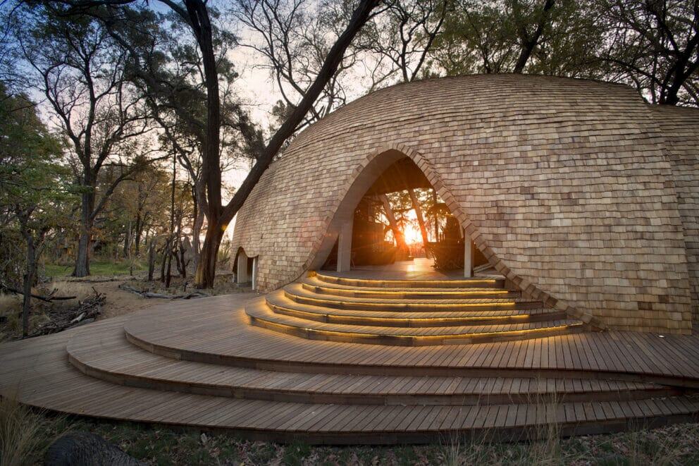 Exterior view of a luxury suite at Sandibe Okavango Safari Lodge, Botswana.
