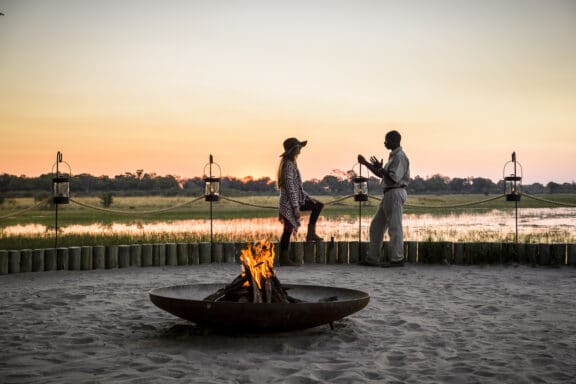 The Okavango Delta during golden hour which is perfect for a Botswana photo safari.
