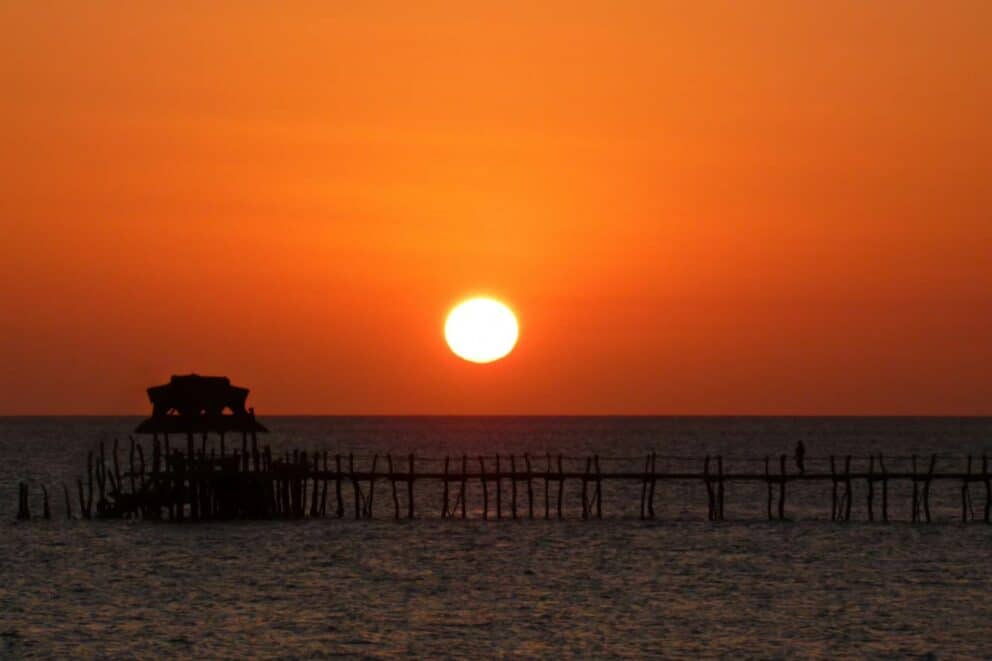 Sun setting over a beach