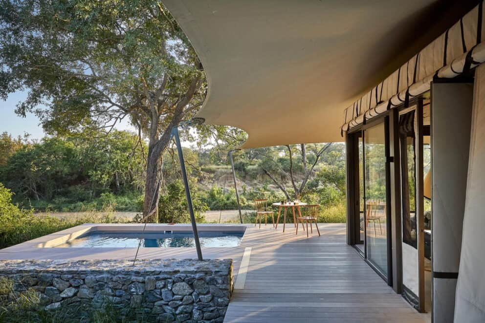 A private plunge pool overlooking the African bush at Saseka Tented Camp in Thornybush Game Reserve, South Africa.