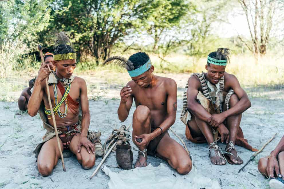 San bushmen doing a demonstration at Meno a Kwena, Botswana.