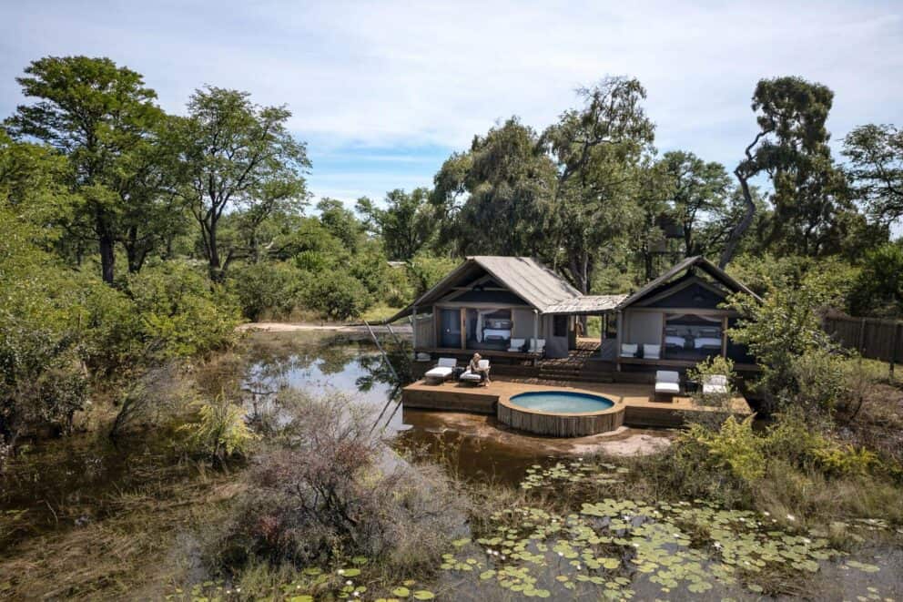 Exterior view of the family tented suite, featuring a private deck and plunge pool at Sable Alley, Botswana.
