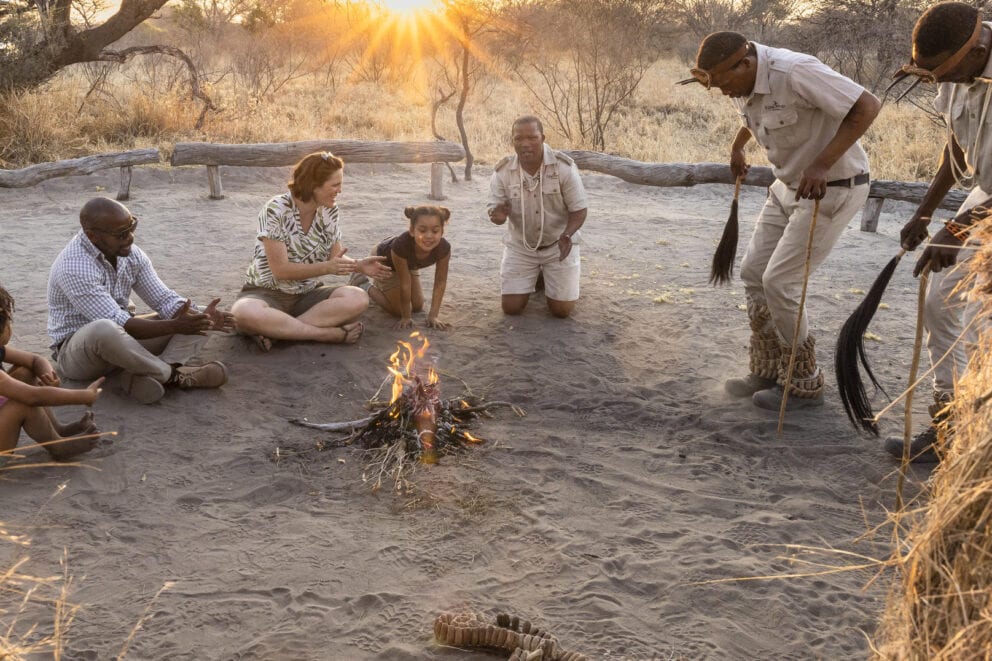 An educational in a bushman village, featuring guides showing their traditional dances at Dinaka, Botswana.