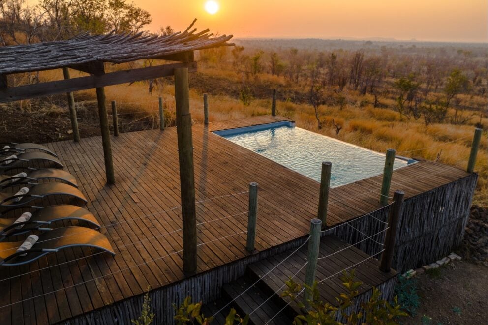 Aerial view of the pool at Nanwitch Lodge. Which you can see on a Zimbabwe safari trip.