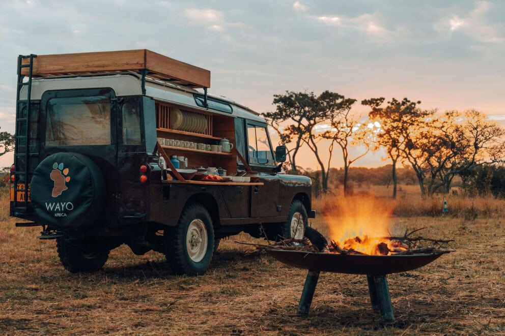 Sundowners at sunset in the Serengeti. One of the most iconic national parks in Africa.