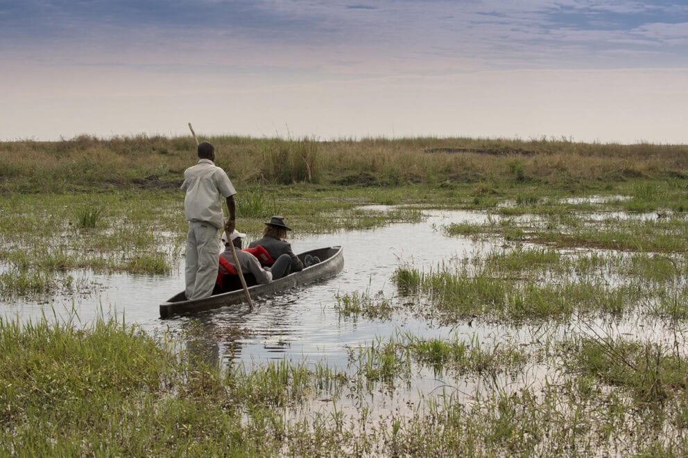 A couples mokoro ride in Linyanti. A great activity for a Botswana honeymoon safari.