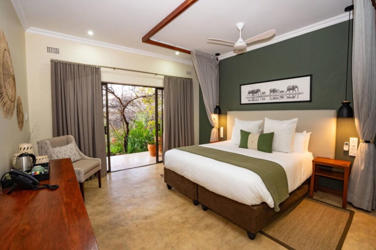 View of a luxury bedroom at Insika Lodge, Zimbabwe.