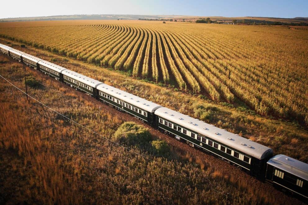 An aerial view of the Rovos Rail train passing through farmland in the North West Province of South Africa.
