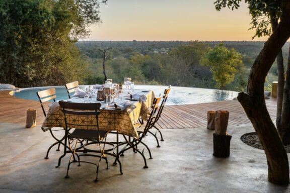 Romantic dining by the pool | Photo credit: Geiger's Camp