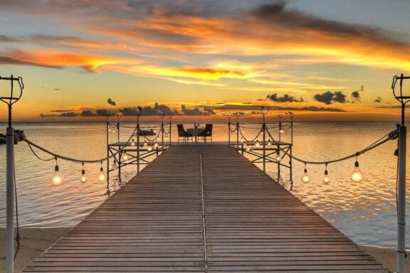 Sunset at jetty of Maradiva Villas, Mauritius | Photo credit: Maradiva Villas