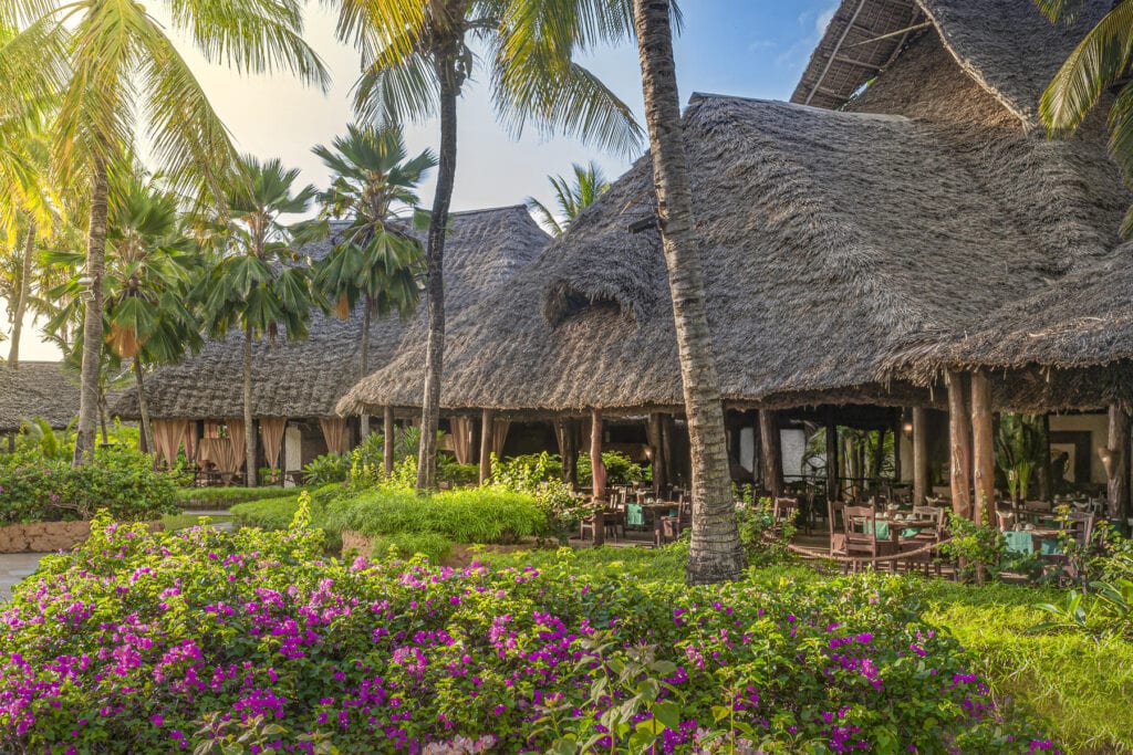 Exterior view of the main area with it's thatched roof at Breezes Beach Club and Spa, Zanzibar.