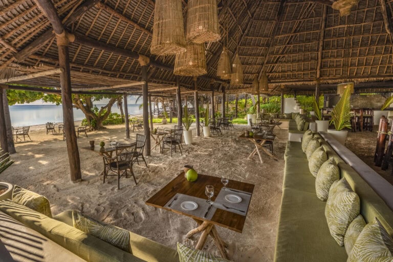 View of the outdoor lounge area on the sand at Breezes Beach Club and Spa, Zanzibar.