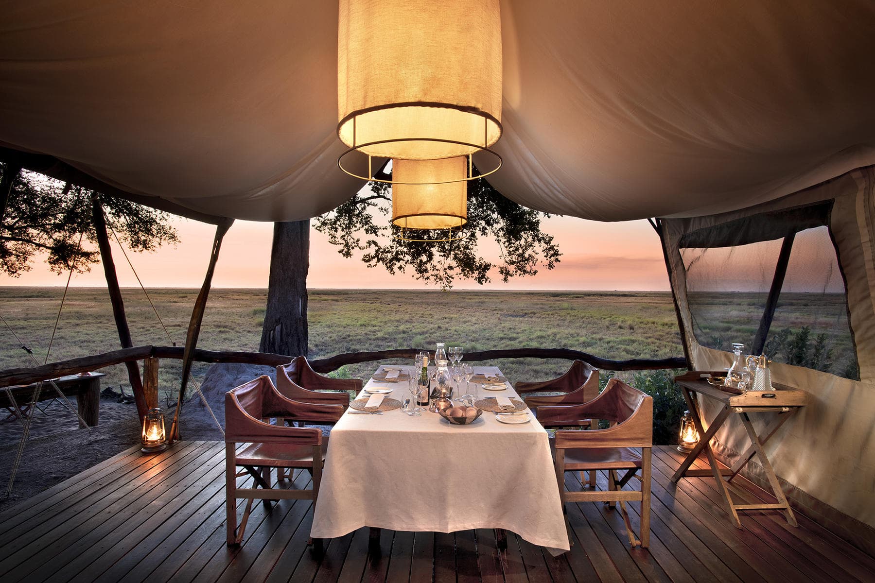 View of a dining table in a tented camp