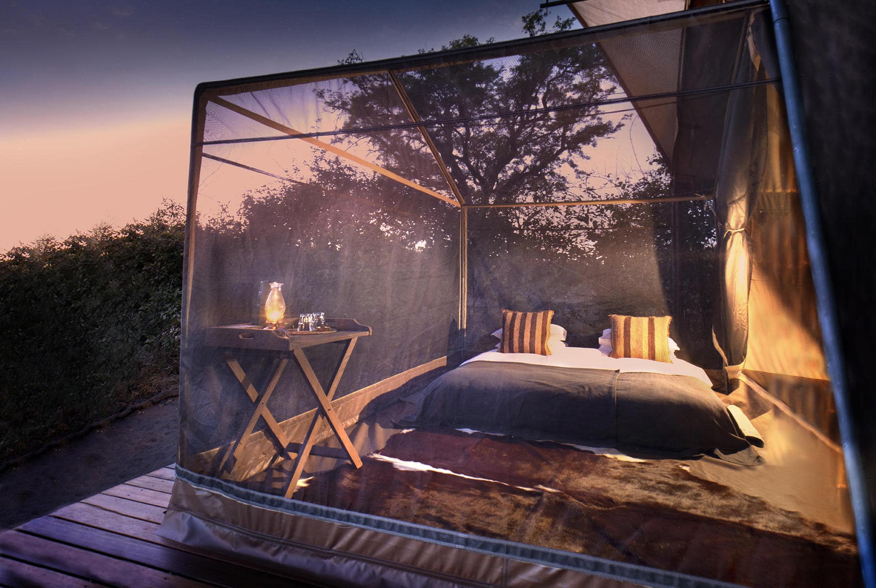 Star bed in Linyanti at dusk. A perfect start or end to a Botswana honeymoon safari