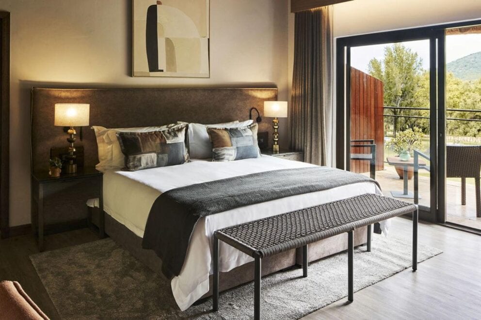 Deluxe room bedroom | Photo credit: Letamo