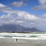 Wind Surfer Against Backdrop of Table Mountain and Cape Town, South Africa