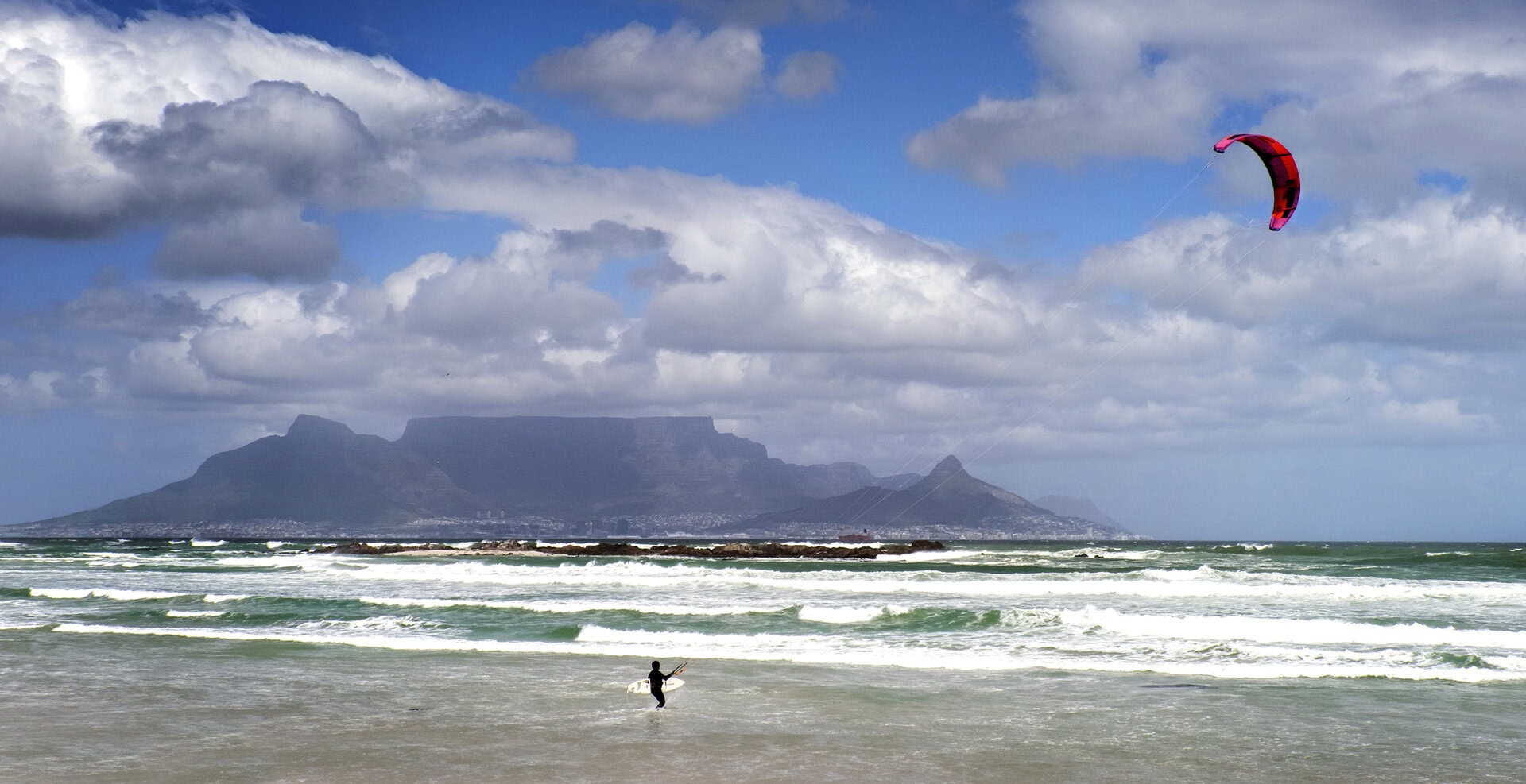 Wind Surfer Against Backdrop of Table Mountain and Cape Town, South Africa