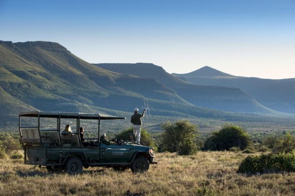 Game tracking on a game drive in safari vehicle at Samara Private Game Reserve