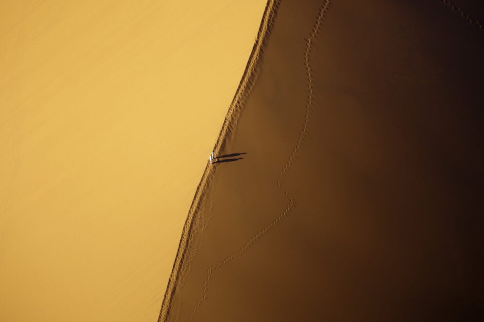 Aerial view of hikers on Dune 45 in Sossusvlei, Namibia. Photo: Getty Images