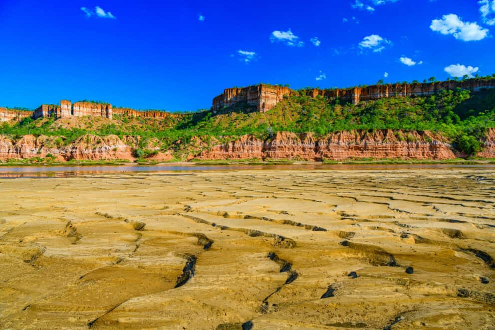 The multi-colored cliffs of Chilojo rise majestically out of the Runde River in Gonarezhou National Park in Zimbabwe.