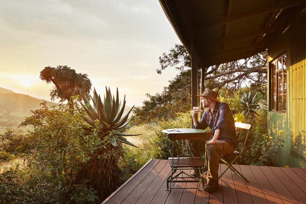 Man watching the sunrise Photo: Unsplash